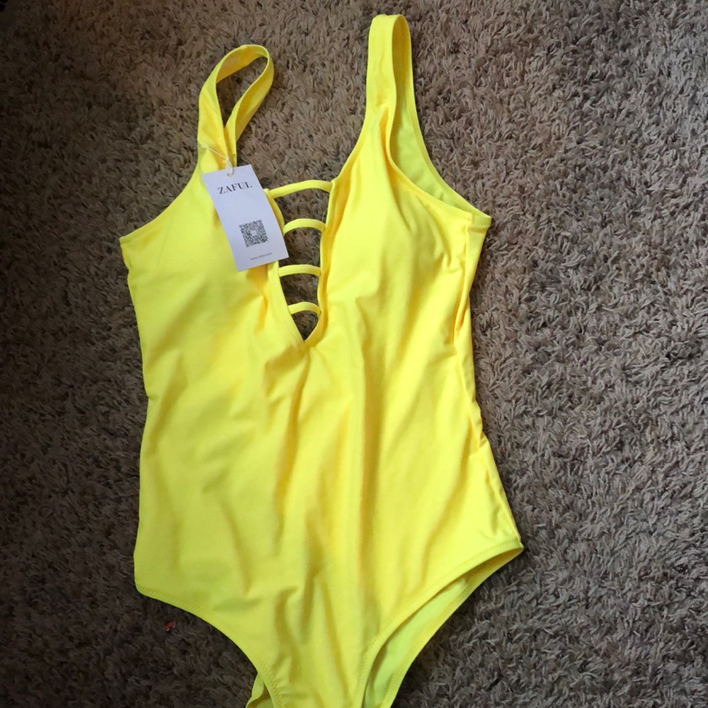 Yellow one piece swim suit